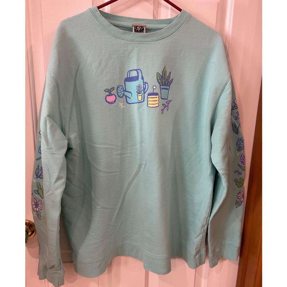 A home for flowers by artist OMOCAT sweatshirt mint garden